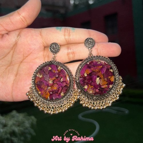 Handmade golden jhumkas with preserved rose petals in resin