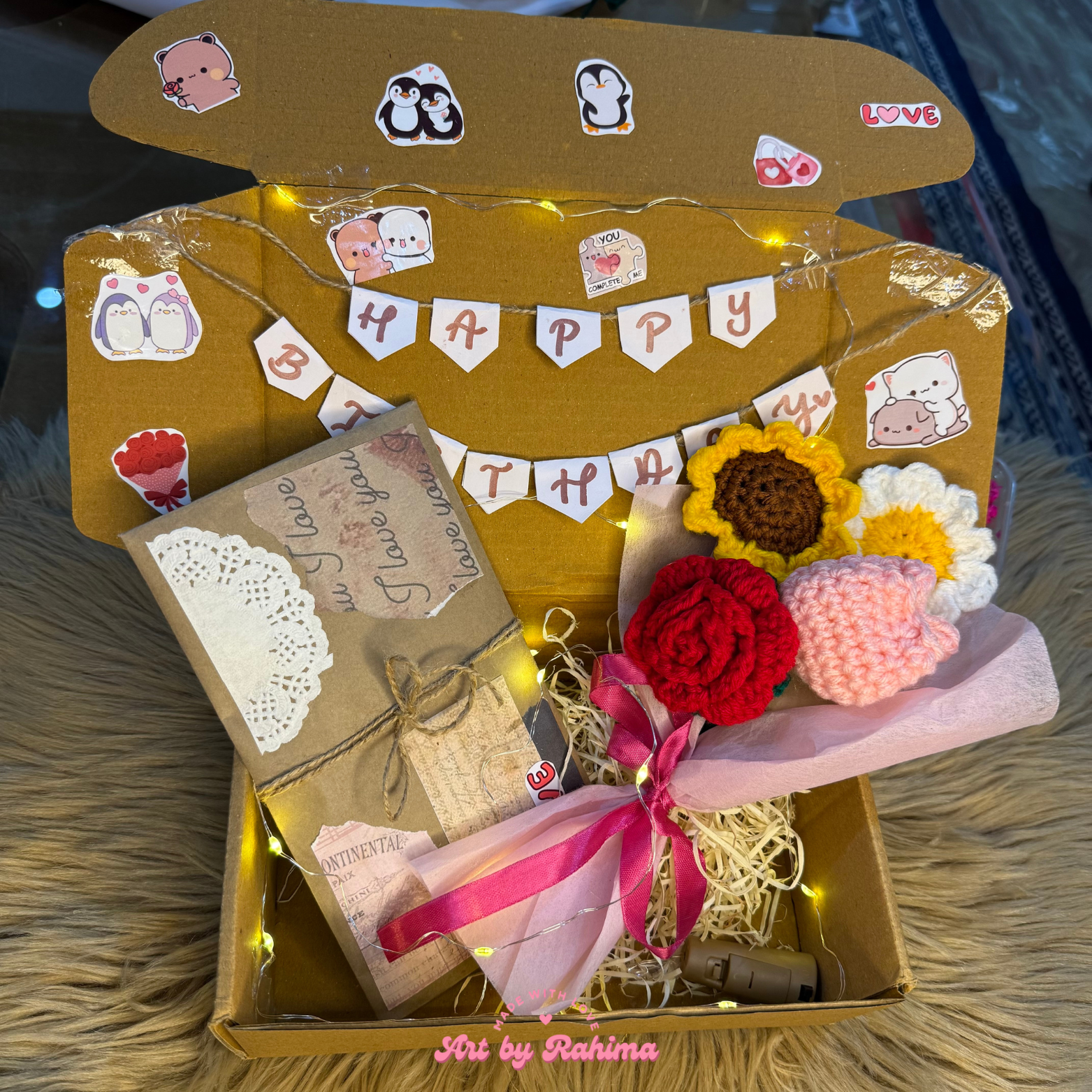 Decorated hamper with personalized letter, crochet bouquet, and fairy lights