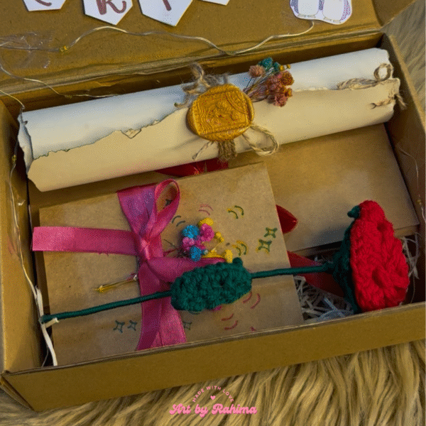 Close-up of trifold and surprise cards inside decorated hamper