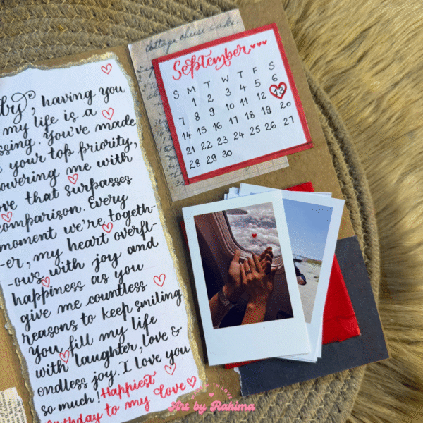 Close-up of handmade trifold letter card with Polaroids and handwritten details