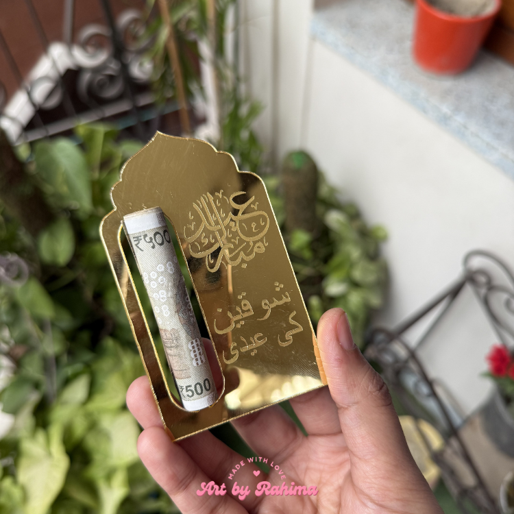 Angled view of Golden Acrylic Eidi Card showing glossy golden finish – Personalized Eid gift