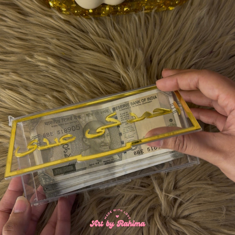 Eidi acrylic box with Urdu name customisation holding currency notes for Eid gifting